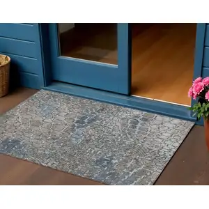 Photo of Silver Blue And Brown Abstract Washable Indoor Outdoor Area Rug
