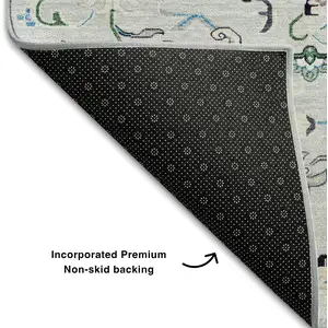 Photo of Silver Blue And Ivory Oriental Washable Area Rug With UV Protection