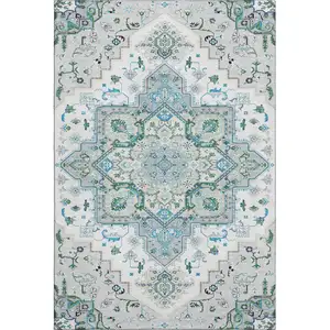 Photo of Silver Blue And Ivory Oriental Washable Area Rug With UV Protection