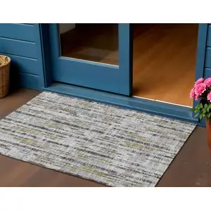 Photo of Silver Charcoal And Gold Abstract Washable Indoor Outdoor Area Rug