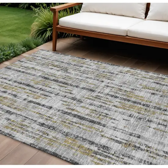 Silver Charcoal And Gold Abstract Washable Indoor Outdoor Area Rug Photo 2