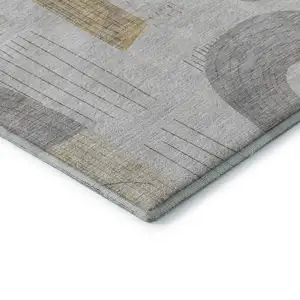 Photo of Silver Gold And Gray Geometric Washable Area Rug With UV Protection