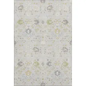 Photo of Silver Gold And Gray Oriental Washable Area Rug With UV Protection