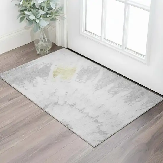 Silver Gold And Ivory Abstract Washable Area Rug With UV Protection Photo 1