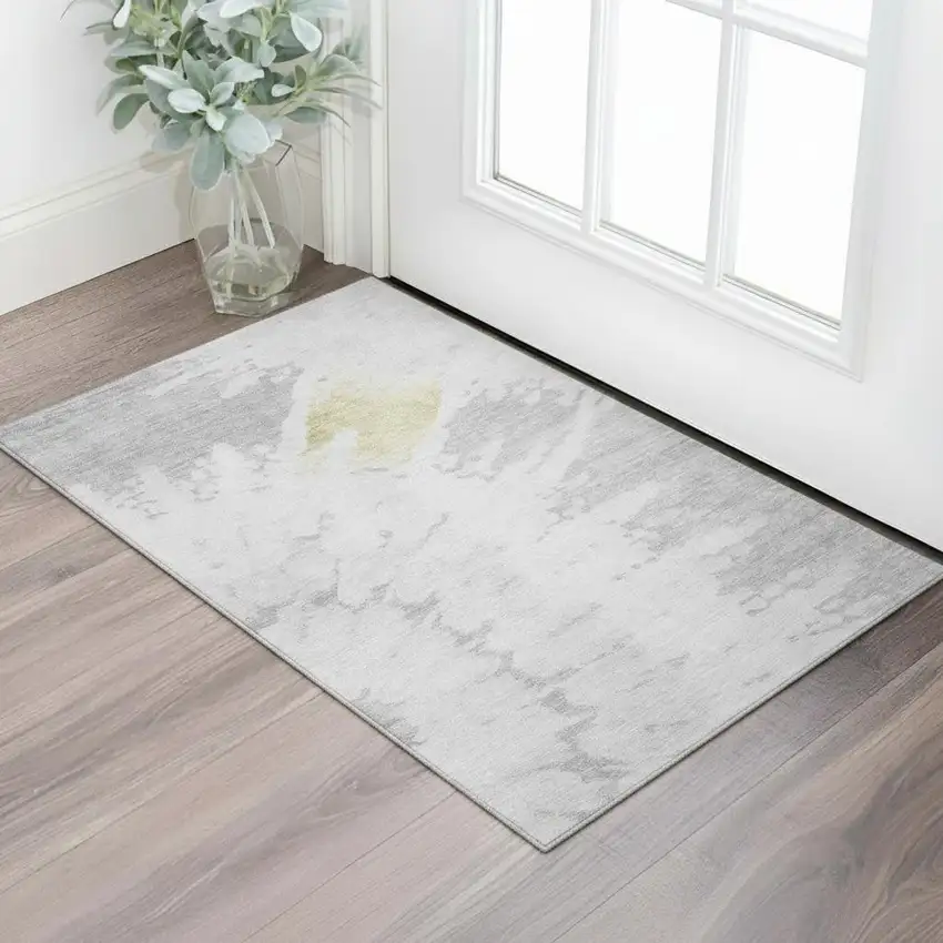 Silver Gold And Ivory Abstract Washable Area Rug With UV Protection Photo 1