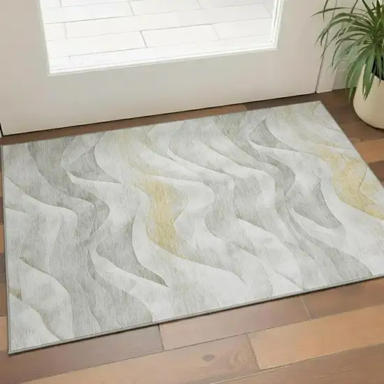 Silver Gold And Ivory Abstract Washable Area Rug With UV Protection Photo 2