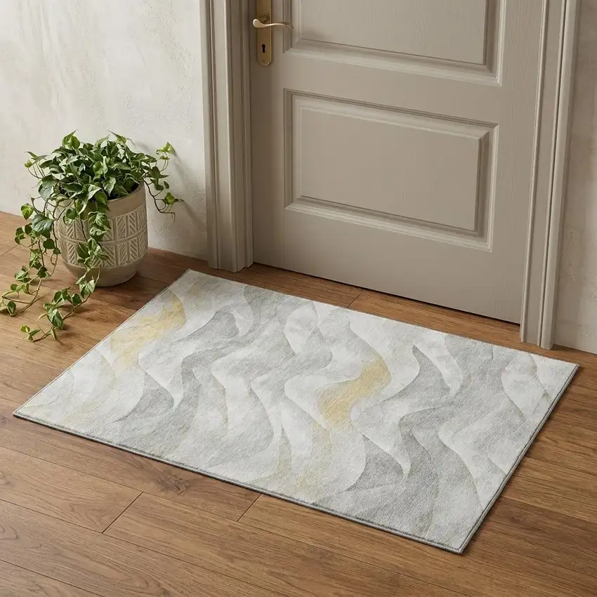 Silver Gold And Ivory Abstract Washable Area Rug With UV Protection Photo 1