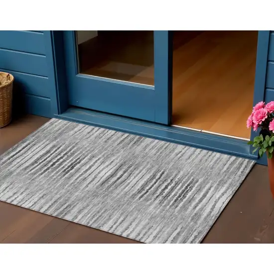Silver Gray And Charcoal Striped Washable Indoor Outdoor Area Rug Photo 1