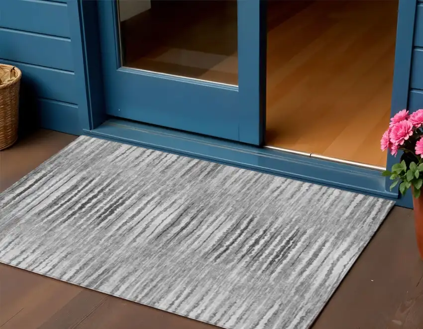 Silver Gray And Charcoal Striped Washable Indoor Outdoor Area Rug Photo 1