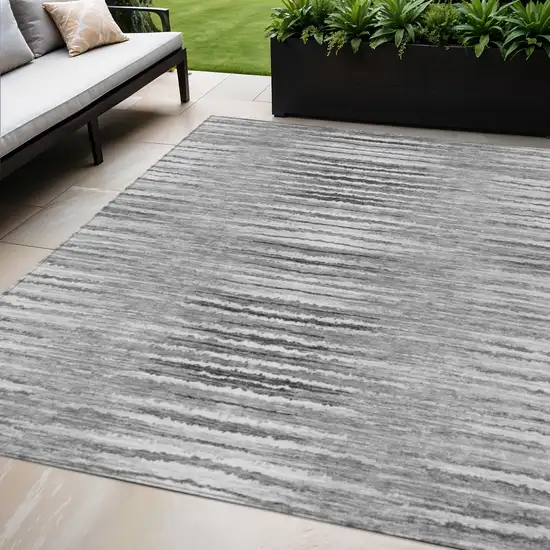 Silver Gray And Charcoal Striped Washable Indoor Outdoor Area Rug Photo 1