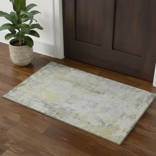 Silver Gray And Gold Abstract Washable Area Rug With UV Protection Photo 1