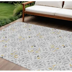 Photo of Silver Gray And Gold Floral Washable Indoor Outdoor Area Rug