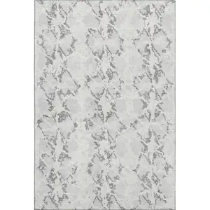 Photo of Silver Gray And Ivory Abstract Washable Area Rug With UV Protection