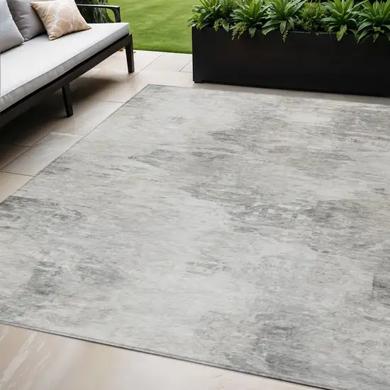 Silver Gray And Ivory Abstract Washable Indoor Outdoor Area Rug Photo 1