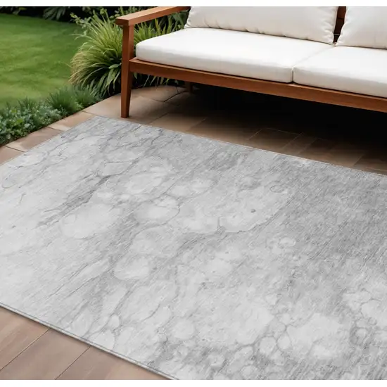 Silver Gray And Ivory Abstract Washable Indoor Outdoor Area Rug Photo 1