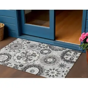 Photo of Silver Gray And Ivory Floral Medallion Washable Indoor Outdoor Area Rug