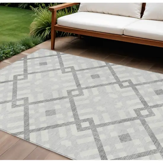 Silver Gray And Ivory Geometric Washable Indoor Outdoor Area Rug Photo 1
