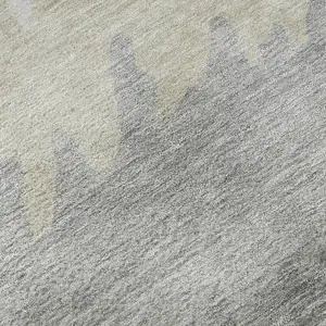 Photo of Silver Gray And Ivory Striped Washable Area Rug With UV Protection