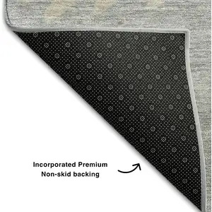 Photo of Silver Gray And Ivory Striped Washable Area Rug With UV Protection