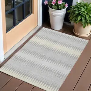 Photo of Silver Gray And Ivory Striped Washable Indoor Outdoor Area Rug