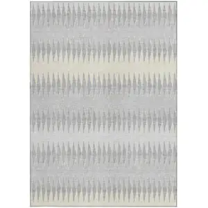 Photo of Silver Gray And Ivory Striped Washable Indoor Outdoor Area Rug