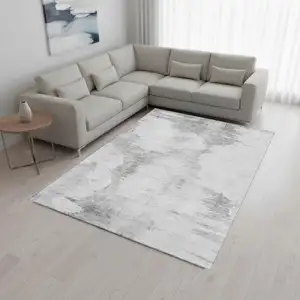 Photo of Silver Gray And Pewter Abstract Washable Area Rug With UV Protection