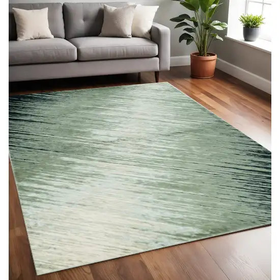 Silver And Gray Abstract Area Rug Photo 1