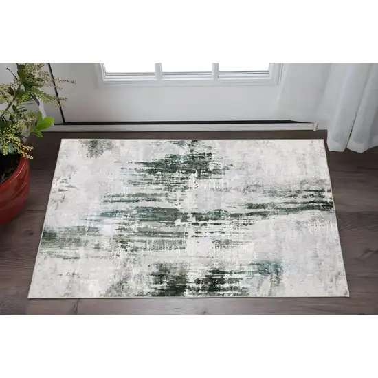 Silver Grey Teal Blue And Charcoal Abstract Printed Stain Resistant Non Skid Area Rug Photo 1