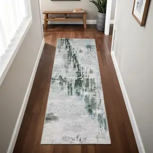 Photo of Silver Grey Teal Blue And Charcoal Abstract Printed Stain Resistant Non Skid Runner Rug