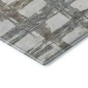Photo of Silver Ivory And Gray Striped Washable Area Rug With UV Protection