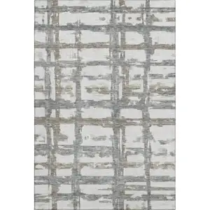Photo of Silver Ivory And Gray Striped Washable Area Rug With UV Protection