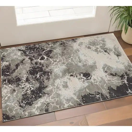 Silver And Black Abstract Area Rug Photo 1