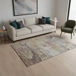 Photo of Silver Mauve And Gold Abstract Washable Area Rug With UV Protection