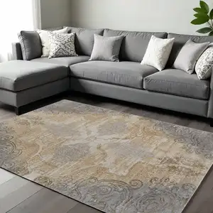 Photo of Silver Tan And Gray Floral Power Loom Area Rug