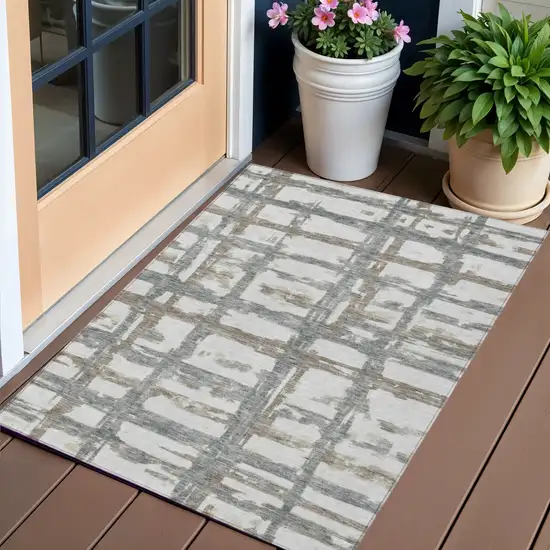 Silver Taupe And Gray Striped Washable Indoor Outdoor Area Rug Photo 1
