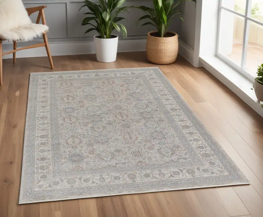 Silver Taupe and Blue Oriental Power Loom Worn Faded Area Rug With Fringe Photo 1