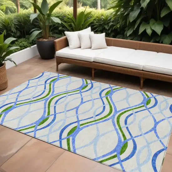Sky Blue And Beige Abstract Washable Indoor Outdoor Area Rug Photo 1