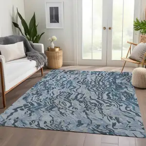 Photo of Sky Blue And Gray Abstract Washable Area Rug With UV Protection