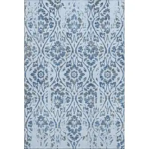 Photo of Sky Blue And Gray Floral Washable Area Rug With UV Protection