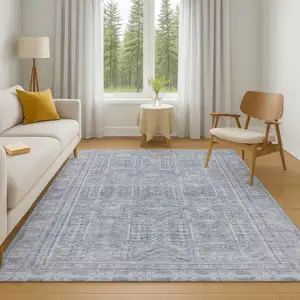 Photo of Sky Blue And Gray Geometric Washable Area Rug With UV Protection