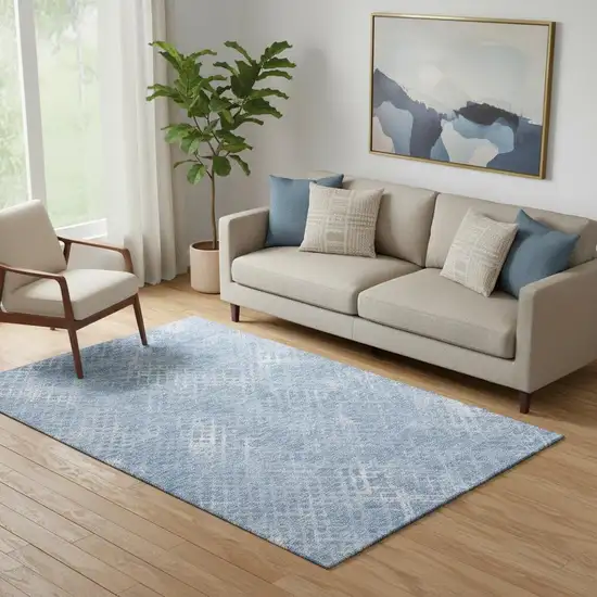 Sky Blue And Ivory Abstract Geometric Washable Area Rug With UV Protection Photo 1