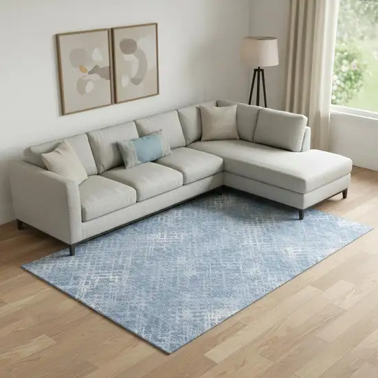 Sky Blue And Ivory Abstract Geometric Washable Area Rug With UV Protection Photo 1