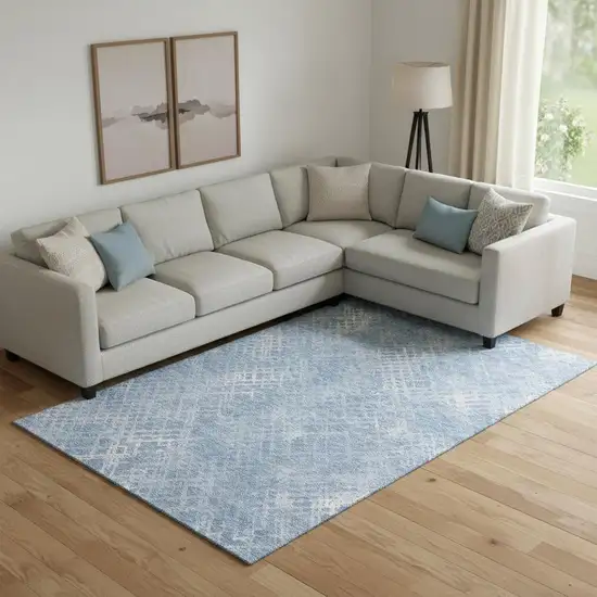 Sky Blue And Ivory Abstract Geometric Washable Area Rug With UV Protection Photo 1