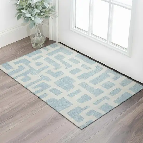 Sky Blue And Ivory Abstract Geometric Washable Area Rug With UV Protection Photo 1