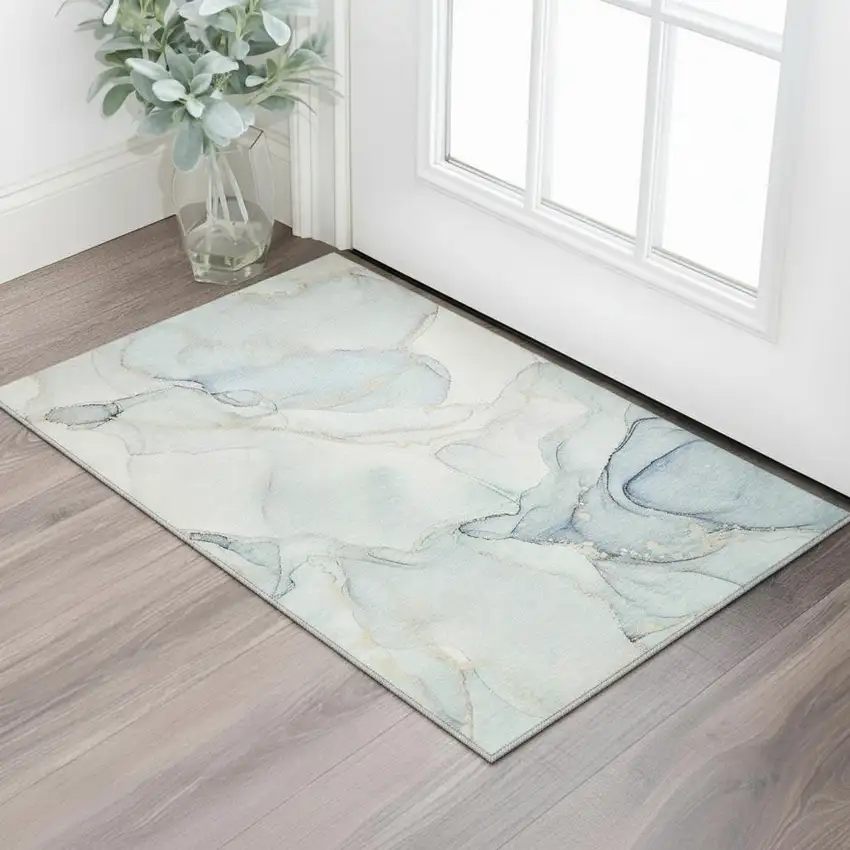 Sky Blue And Ivory Abstract Washable Area Rug With UV Protection Photo 1