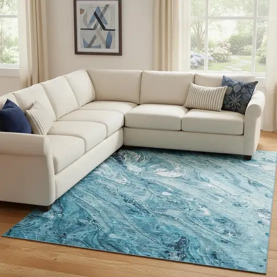 Sky Blue And Ivory Abstract Washable Area Rug With UV Protection Photo 1