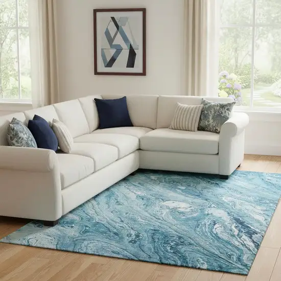 Sky Blue And Ivory Abstract Washable Area Rug With UV Protection Photo 1