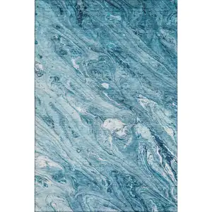 Photo of Sky Blue And Ivory Abstract Washable Area Rug With UV Protection