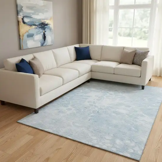 Sky Blue And Ivory Abstract Washable Area Rug With UV Protection Photo 1