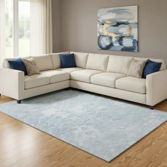 Sky Blue And Ivory Abstract Washable Area Rug With UV Protection Photo 1